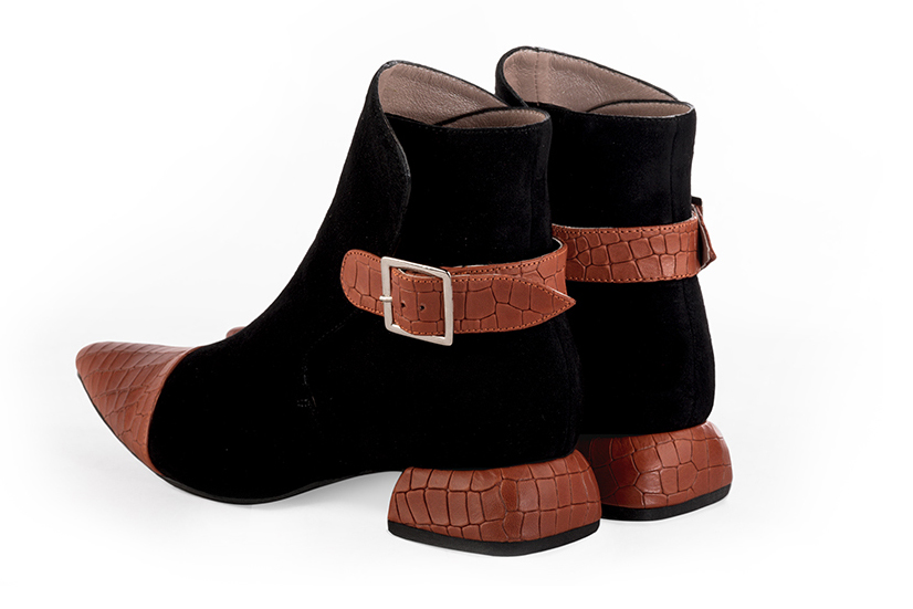 Women's terracotta orange and matt black elegant ankle boots, with buckles at the back. Tapered toe. Low flare heels - Rear view